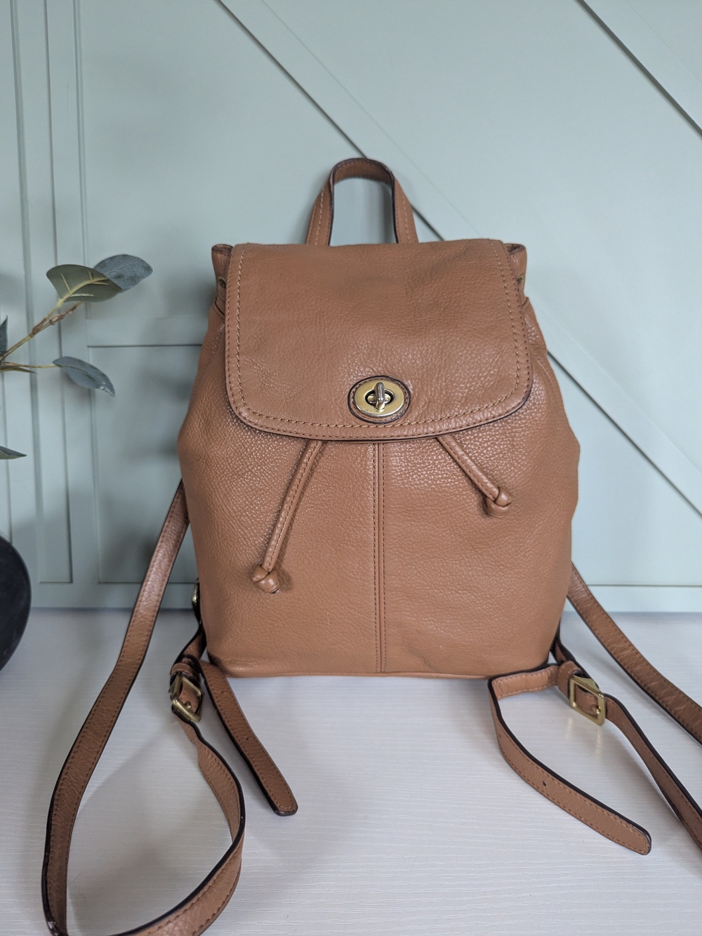 Coach Pebbled Leather Drawstring Backpack in Tan